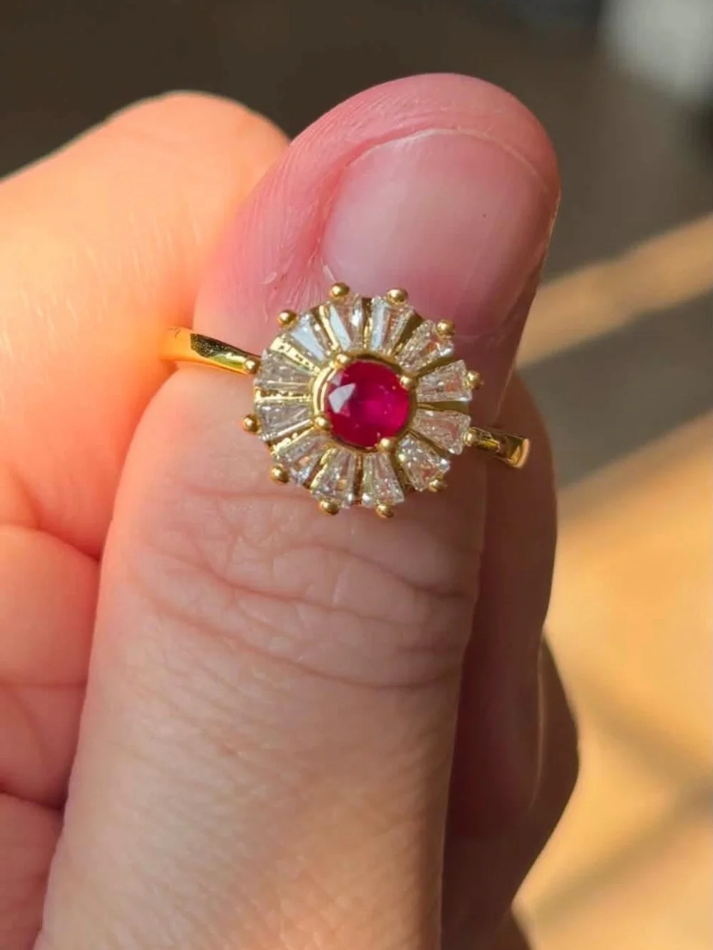 Gold Ring with Red Center Stone and Radiant Halo